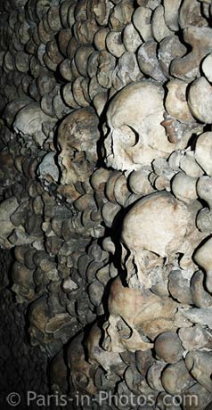 Paris catacombs, tunnels, passageways, ossuary, skulls, bones, official entrance, tourist attraction